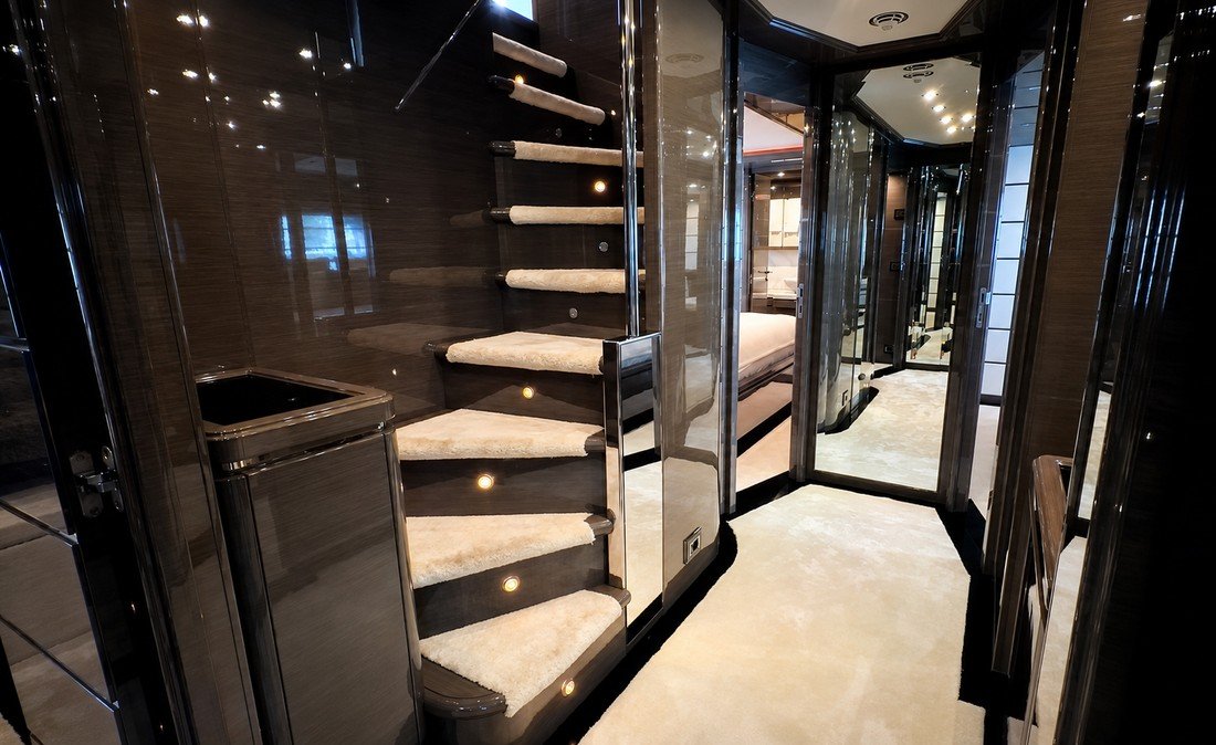 Gloss timber staircase with inset lighting